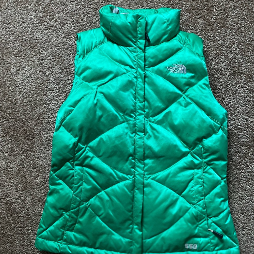 North face green vest Read